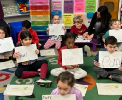 Child Pointing at Whiteboard 2