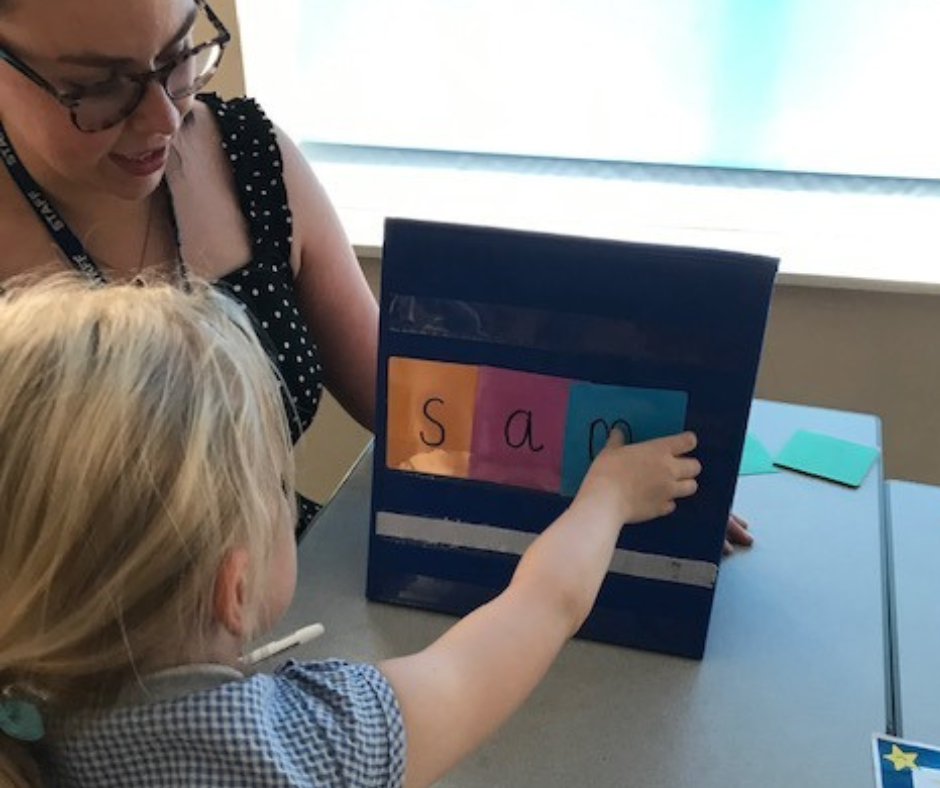 Child Pointing at Whiteboard 2