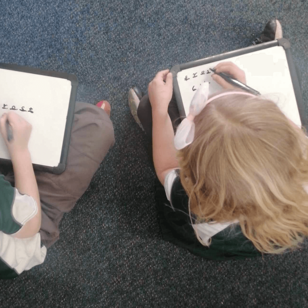 Child Pointing at Whiteboard 2