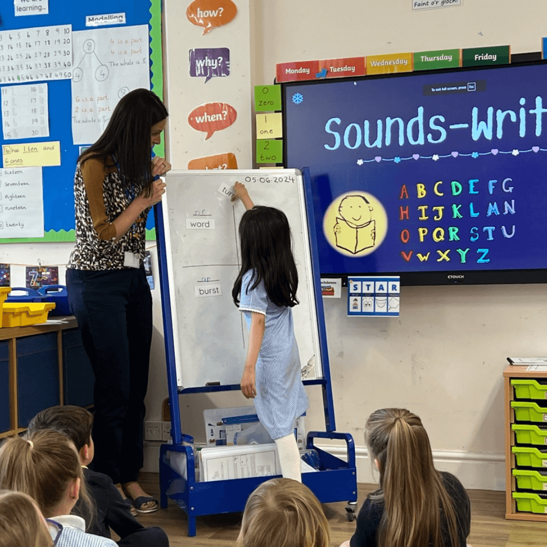 Child Pointing at Whiteboard 2