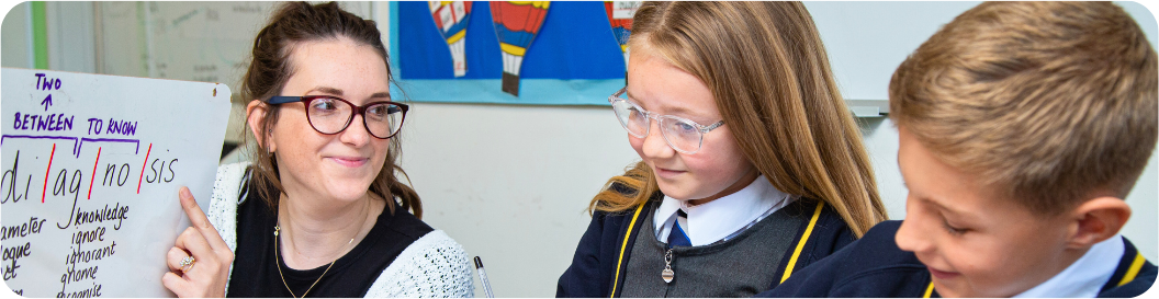 Woman teaching phonics Woman teaching phonics
