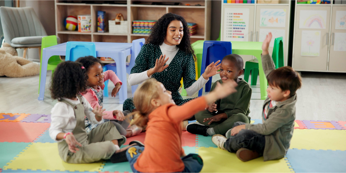 Support Language & Physical Development Teacher with group of children