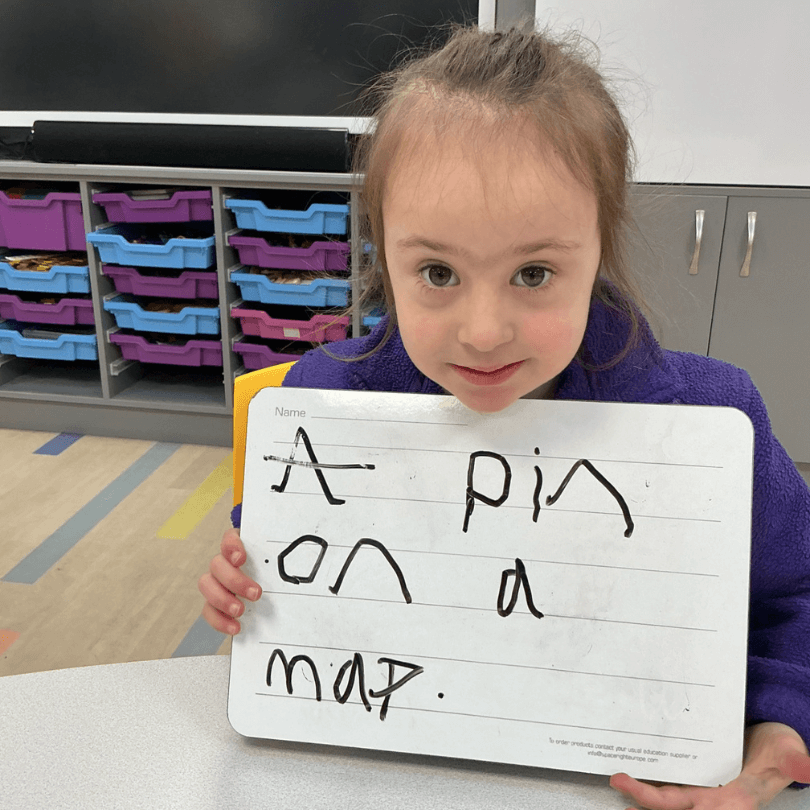 Child Pointing at Whiteboard 2