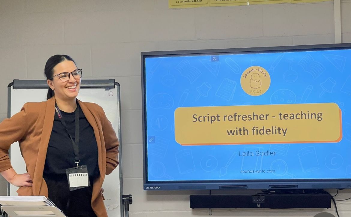 Phonics Literacy Specialist giving a presentation